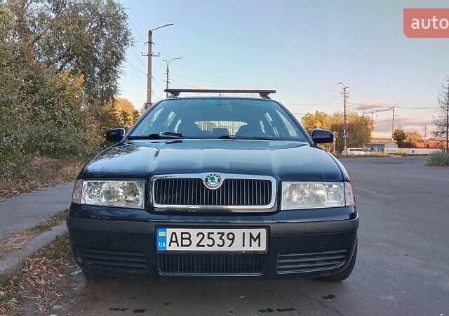 Черный Шкода Октавия, объемом двигателя 1.6 л и пробегом 200 тыс. км за 5800 $, фото 1 на Automoto.ua