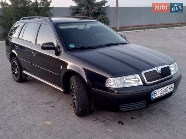 Черный Шкода Октавия, объемом двигателя 1.6 л и пробегом 201 тыс. км за 5800 $, фото 1 на Automoto.ua