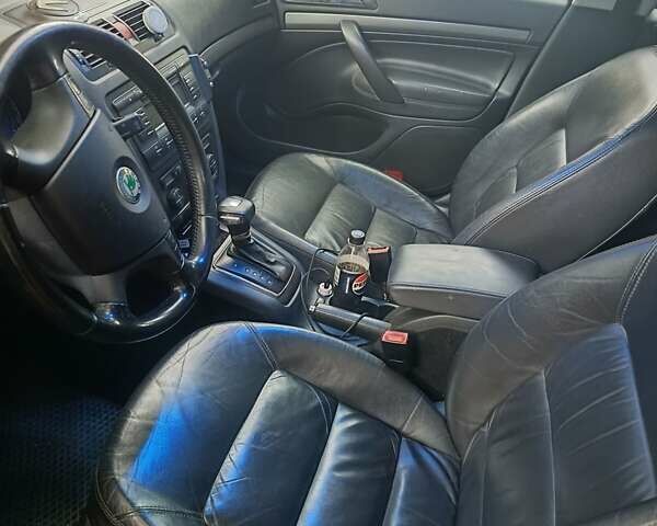 Черный Шкода Октавия, объемом двигателя 1.6 л и пробегом 294 тыс. км за 6200 $, фото 1 на Automoto.ua