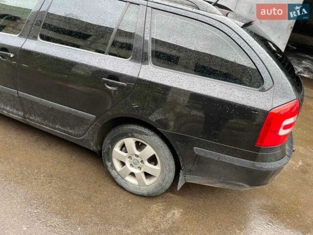 Черный Шкода Октавия, объемом двигателя 1.6 л и пробегом 218 тыс. км за 5800 $, фото 1 на Automoto.ua