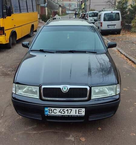 Черный Шкода Октавия, объемом двигателя 1.6 л и пробегом 200 тыс. км за 5500 $, фото 1 на Automoto.ua