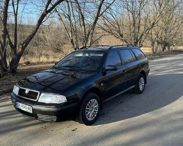 Черный Шкода Октавия, объемом двигателя 1.6 л и пробегом 316 тыс. км за 3800 $, фото 1 на Automoto.ua