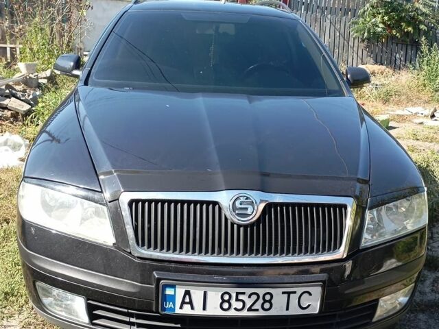 Черный Шкода Октавия, объемом двигателя 1.6 л и пробегом 280 тыс. км за 6000 $, фото 1 на Automoto.ua