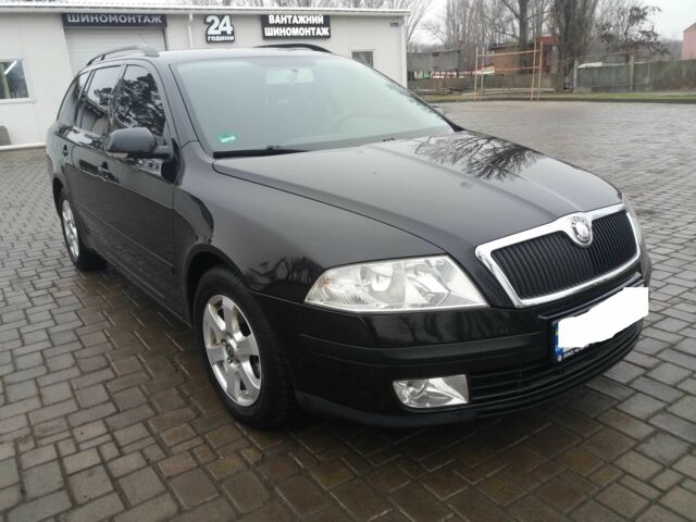 Чорний Шкода Октавія, об'ємом двигуна 1.8 л та пробігом 251 тис. км за 5700 $, фото 1 на Automoto.ua