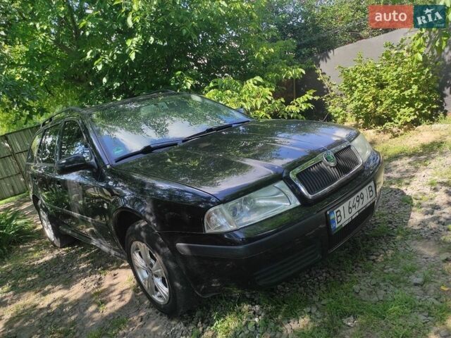 Чорний Шкода Октавія, об'ємом двигуна 1.6 л та пробігом 281 тис. км за 5700 $, фото 1 на Automoto.ua