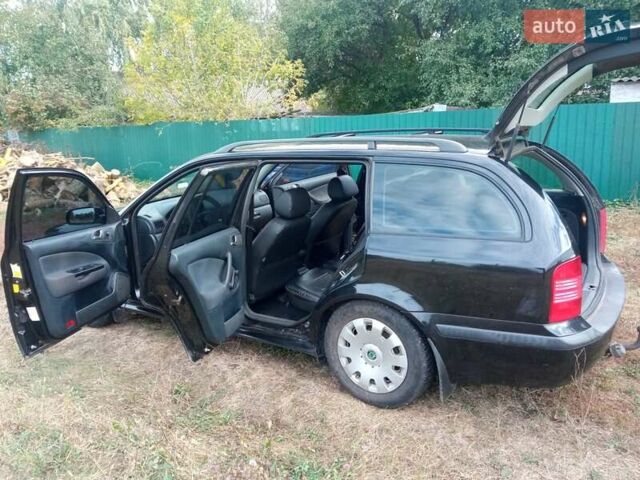 Черный Шкода Октавия, объемом двигателя 1.6 л и пробегом 145 тыс. км за 6700 $, фото 1 на Automoto.ua