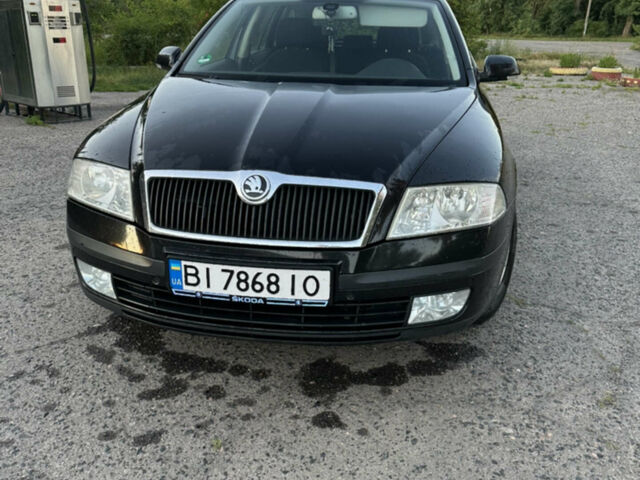 Чорний Шкода Октавія, об'ємом двигуна 2 л та пробігом 225 тис. км за 5800 $, фото 1 на Automoto.ua