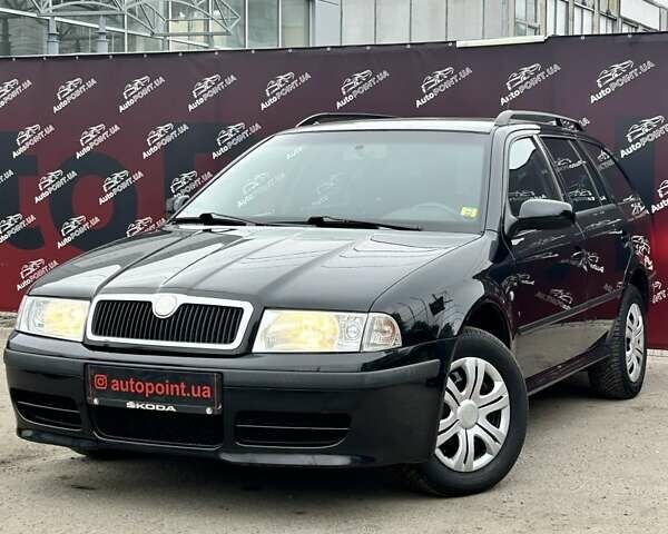 Чорний Шкода Октавія, об'ємом двигуна 1.6 л та пробігом 198 тис. км за 5900 $, фото 1 на Automoto.ua
