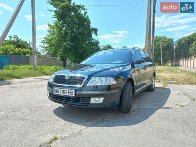 Черный Шкода Октавия, объемом двигателя 1.6 л и пробегом 210 тыс. км за 7500 $, фото 1 на Automoto.ua