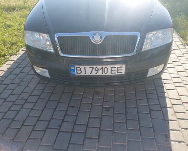 Черный Шкода Октавия, объемом двигателя 1.6 л и пробегом 193 тыс. км за 5500 $, фото 1 на Automoto.ua