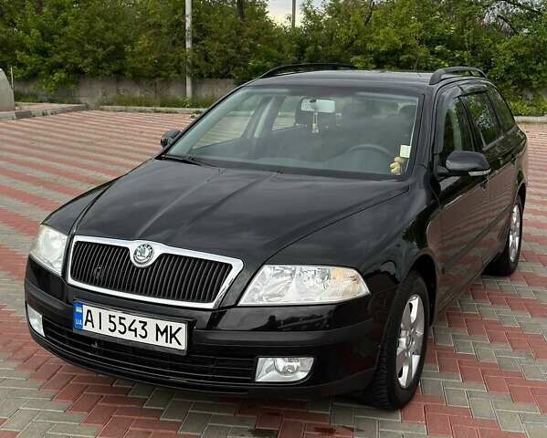 Черный Шкода Октавия, объемом двигателя 1.8 л и пробегом 222 тыс. км за 6500 $, фото 1 на Automoto.ua