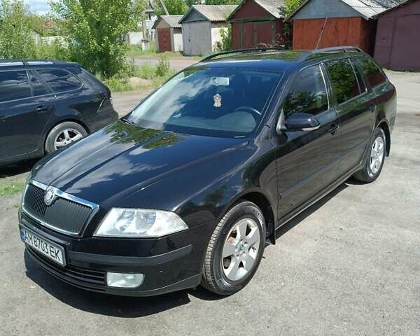 Черный Шкода Октавия, объемом двигателя 1.6 л и пробегом 232 тыс. км за 6200 $, фото 1 на Automoto.ua