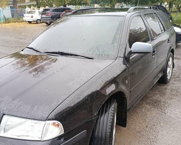 Чорний Шкода Октавія, об'ємом двигуна 1.6 л та пробігом 301 тис. км за 4900 $, фото 1 на Automoto.ua
