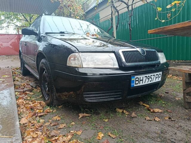 Черный Шкода Октавия, объемом двигателя 1.6 л и пробегом 220 тыс. км за 4000 $, фото 1 на Automoto.ua