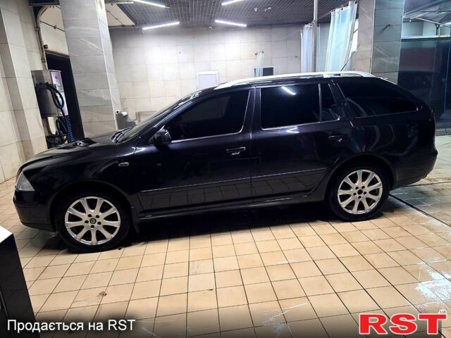 Чорний Шкода Октавія, об'ємом двигуна 2 л та пробігом 282 тис. км за 6700 $, фото 1 на Automoto.ua