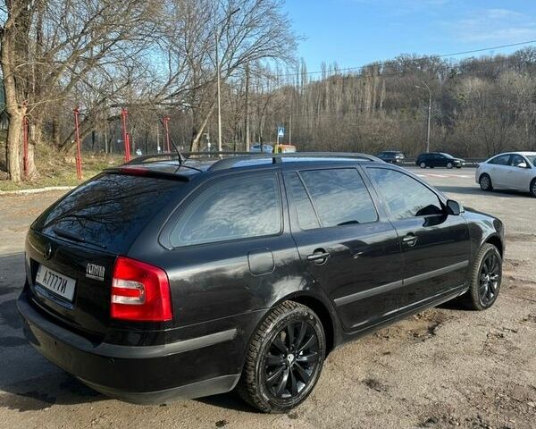 Черный Шкода Октавия, объемом двигателя 1.6 л и пробегом 220 тыс. км за 6500 $, фото 1 на Automoto.ua