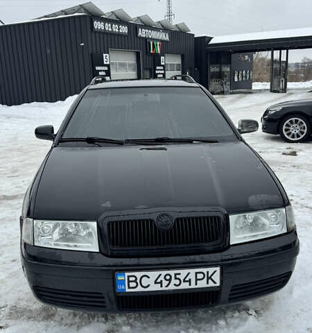 Черный Шкода Октавия, объемом двигателя 1.6 л и пробегом 236 тыс. км за 4200 $, фото 1 на Automoto.ua