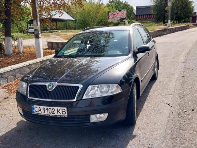 Чорний Шкода Октавія, об'ємом двигуна 1.6 л та пробігом 261 тис. км за 7125 $, фото 1 на Automoto.ua