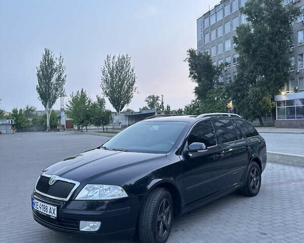 Черный Шкода Октавия, объемом двигателя 1.6 л и пробегом 204 тыс. км за 6450 $, фото 1 на Automoto.ua