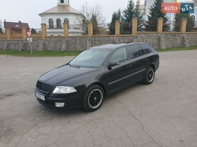 Черный Шкода Октавия, объемом двигателя 1.6 л и пробегом 153 тыс. км за 7400 $, фото 1 на Automoto.ua