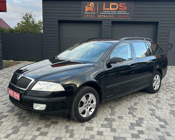 Чорний Шкода Октавія, об'ємом двигуна 1.6 л та пробігом 210 тис. км за 6900 $, фото 1 на Automoto.ua