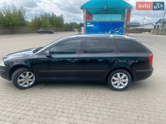 Черный Шкода Октавия, объемом двигателя 1.6 л и пробегом 251 тыс. км за 5800 $, фото 1 на Automoto.ua