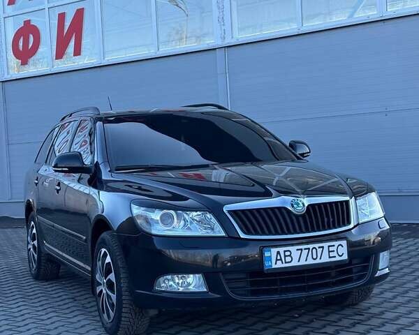 Черный Шкода Октавия, объемом двигателя 1.6 л и пробегом 208 тыс. км за 8999 $, фото 1 на Automoto.ua