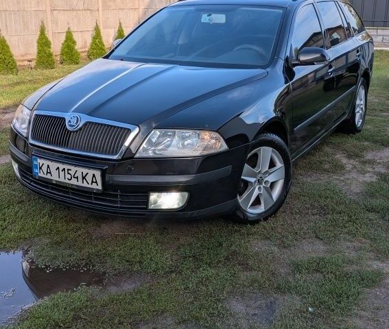 Чорний Шкода Октавія, об'ємом двигуна 1.6 л та пробігом 204 тис. км за 4694 $, фото 1 на Automoto.ua