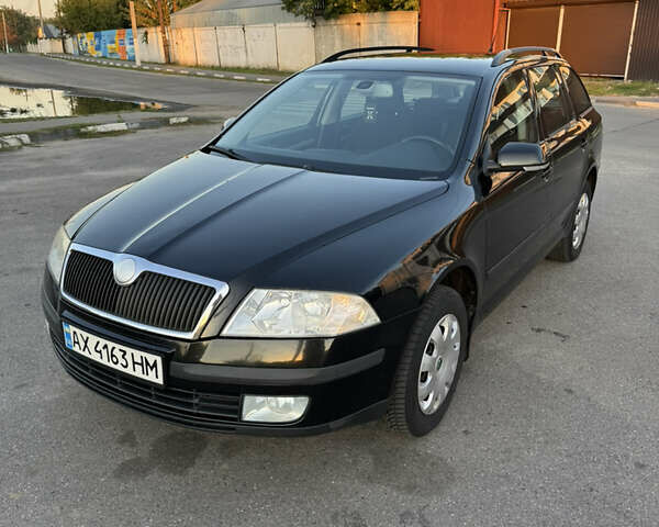 Черный Шкода Октавия, объемом двигателя 1.6 л и пробегом 245 тыс. км за 7200 $, фото 1 на Automoto.ua