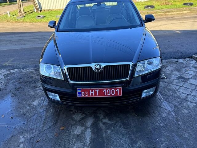 Черный Шкода Октавия, объемом двигателя 2 л и пробегом 248 тыс. км за 7800 $, фото 1 на Automoto.ua