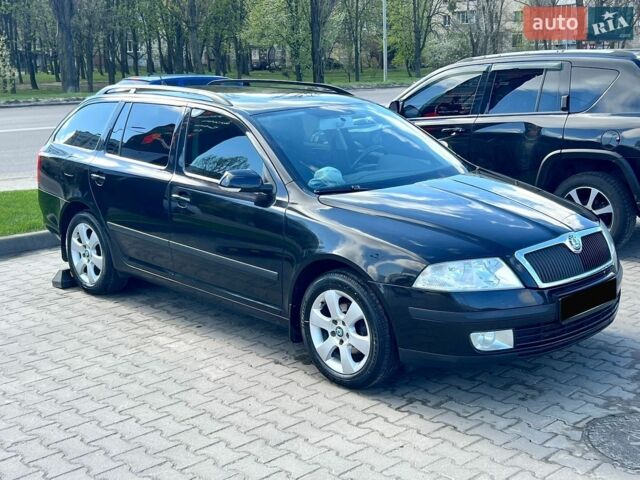 Черный Шкода Октавия, объемом двигателя 1.6 л и пробегом 223 тыс. км за 6300 $, фото 1 на Automoto.ua