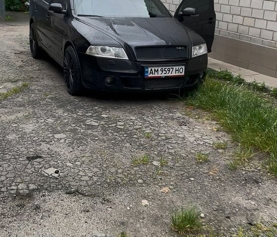 Черный Шкода Октавия, объемом двигателя 2 л и пробегом 295 тыс. км за 7650 $, фото 1 на Automoto.ua