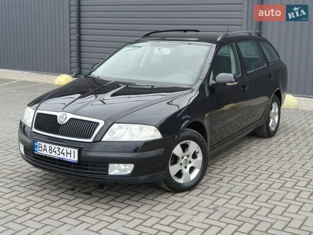 Черный Шкода Октавия, объемом двигателя 1.6 л и пробегом 230 тыс. км за 6999 $, фото 1 на Automoto.ua