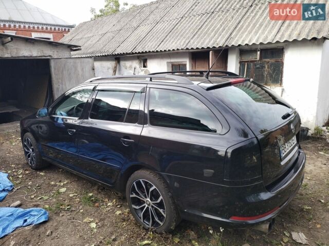 Черный Шкода Октавия, объемом двигателя 2 л и пробегом 221 тыс. км за 8536 $, фото 1 на Automoto.ua