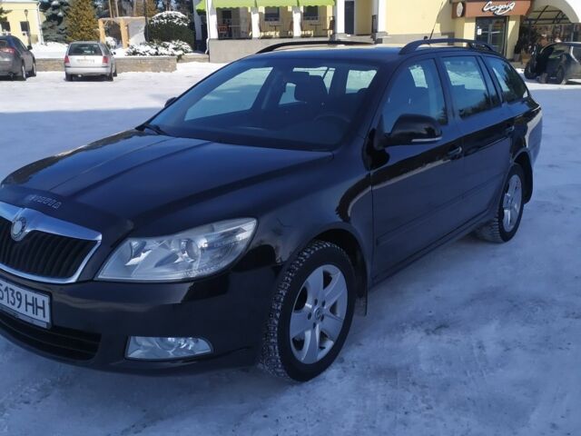 Черный Шкода Октавия, объемом двигателя 1.4 л и пробегом 187 тыс. км за 6999 $, фото 1 на Automoto.ua