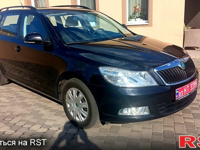 Черный Шкода Октавия, объемом двигателя 1.8 л и пробегом 146 тыс. км за 7300 $, фото 1 на Automoto.ua