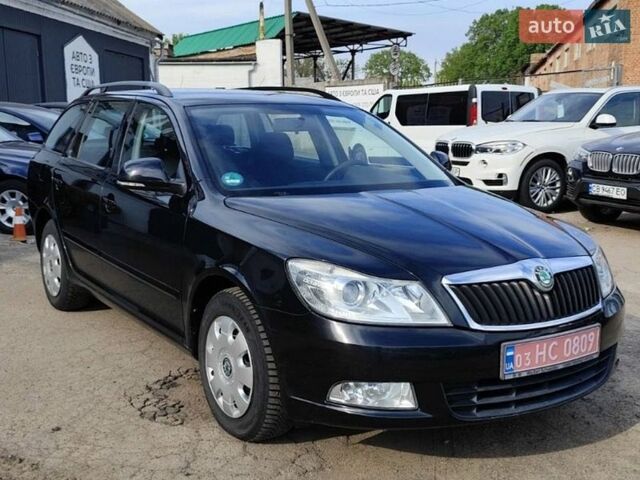 Черный Шкода Октавия, объемом двигателя 1.6 л и пробегом 219 тыс. км за 6800 $, фото 1 на Automoto.ua