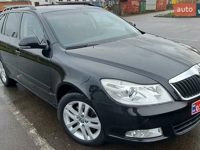 Черный Шкода Октавия, объемом двигателя 1.8 л и пробегом 213 тыс. км за 7500 $, фото 1 на Automoto.ua