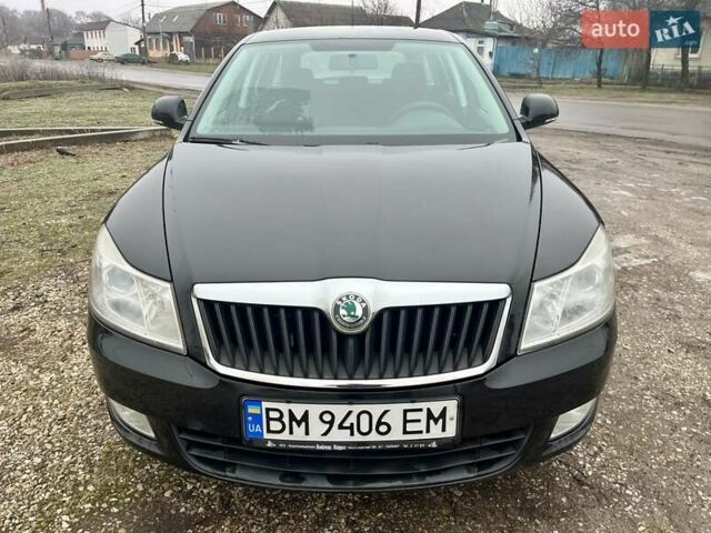 Черный Шкода Октавия, объемом двигателя 1.4 л и пробегом 165 тыс. км за 6999 $, фото 1 на Automoto.ua