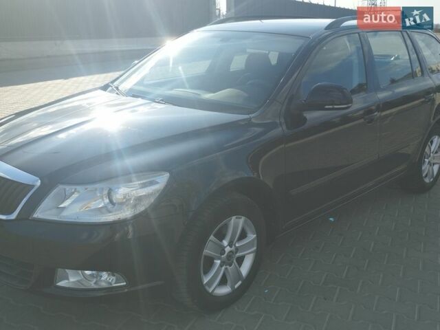 Черный Шкода Октавия, объемом двигателя 1.4 л и пробегом 260 тыс. км за 6400 $, фото 1 на Automoto.ua