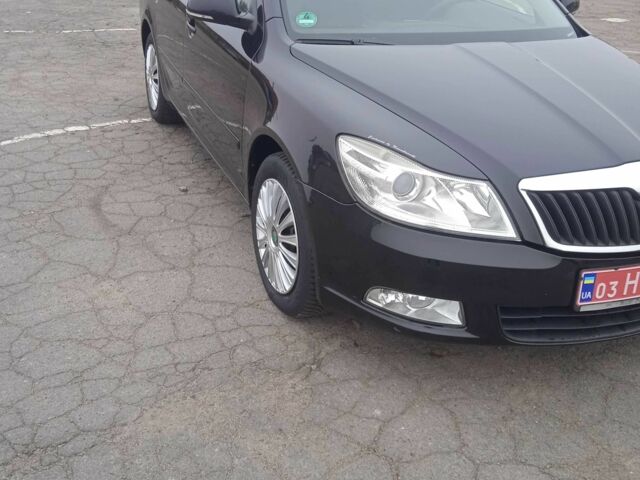 Черный Шкода Октавия, объемом двигателя 1.6 л и пробегом 193 тыс. км за 7400 $, фото 1 на Automoto.ua