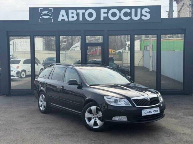 Черный Шкода Октавия, объемом двигателя 1.8 л и пробегом 225 тыс. км за 9490 $, фото 1 на Automoto.ua