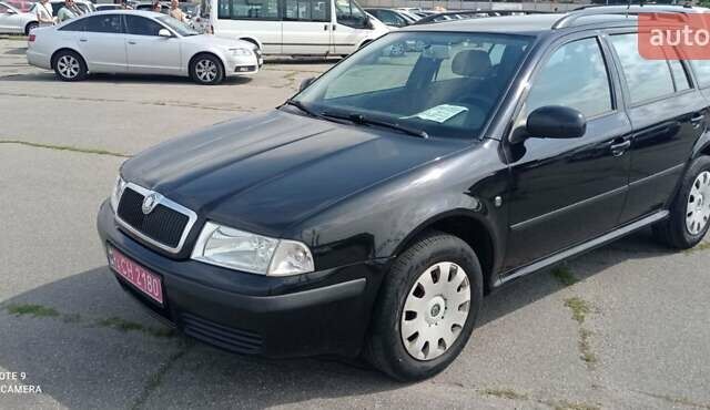 Черный Шкода Октавия, объемом двигателя 1.6 л и пробегом 273 тыс. км за 5600 $, фото 1 на Automoto.ua