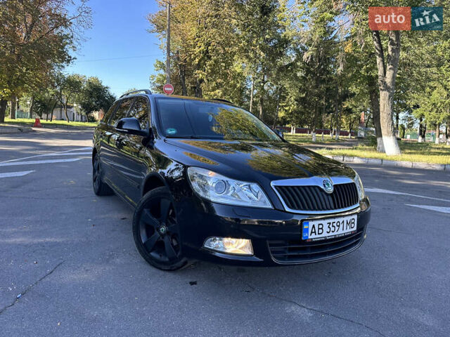 Чорний Шкода Октавія, об'ємом двигуна 1.6 л та пробігом 145 тис. км за 8599 $, фото 1 на Automoto.ua