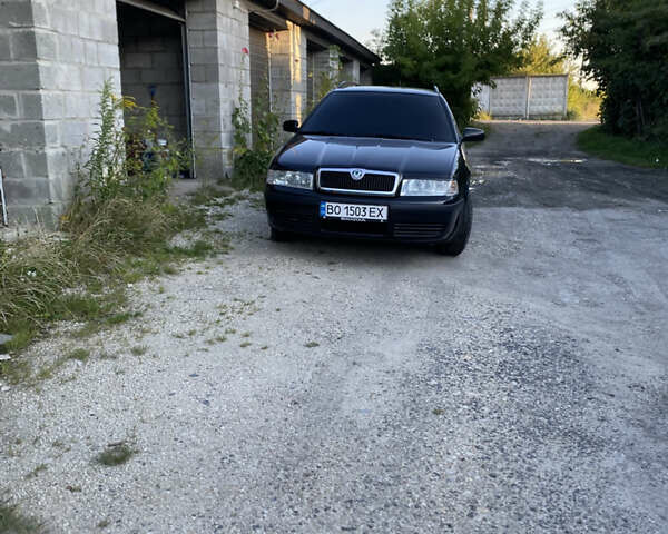 Чорний Шкода Октавія, об'ємом двигуна 1.6 л та пробігом 194 тис. км за 7400 $, фото 1 на Automoto.ua