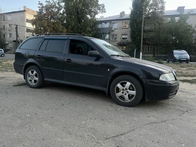 Черный Шкода Октавия, объемом двигателя 1.9 л и пробегом 185 тыс. км за 4990 $, фото 1 на Automoto.ua