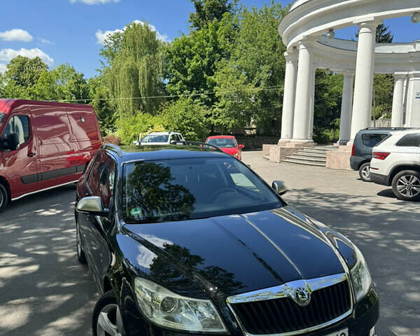 Черный Шкода Октавия, объемом двигателя 1.8 л и пробегом 153 тыс. км за 7600 $, фото 1 на Automoto.ua