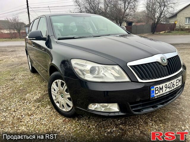 Черный Шкода Октавия, объемом двигателя 1.4 л и пробегом 165 тыс. км за 6999 $, фото 1 на Automoto.ua