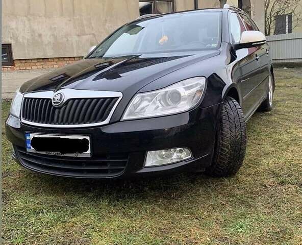 Черный Шкода Октавия, объемом двигателя 1.6 л и пробегом 210 тыс. км за 8500 $, фото 1 на Automoto.ua