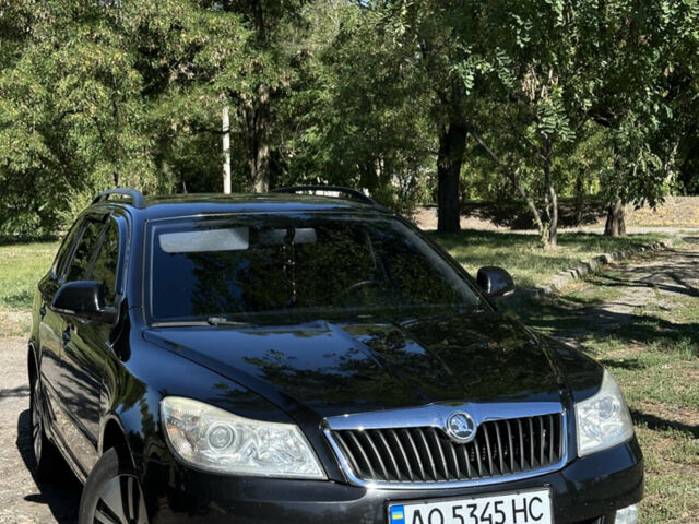 Чорний Шкода Октавія, об'ємом двигуна 1.39 л та пробігом 260 тис. км за 7200 $, фото 1 на Automoto.ua